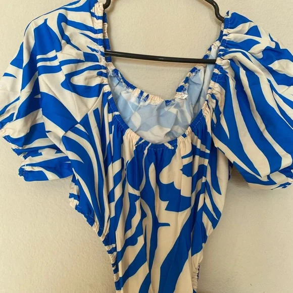 Blue and cream colored all over print off the shoulder, ruffle  dress - Picture 7 of 7
